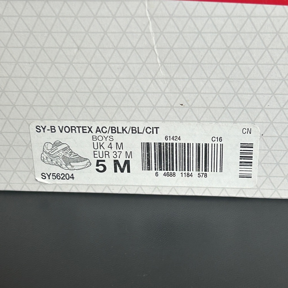 Youth boys black and blue sneakers with Velcro. New in box